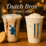 Dutch Bros white coffee drinks served iced with whipped cream and cookie