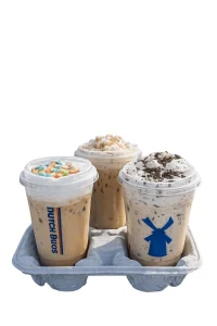 Dutch Bros shakes variety pack including Birthday Cake Shake, Ninja Shake, and Vanilla Shake in a drink carrier